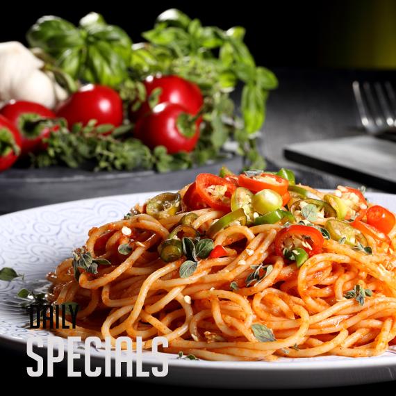 Spaghetti in marinara sauce with fresh herbs